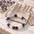 Bracelet LORRAHA posé sur sa pochette en tissu, devant sa boîte